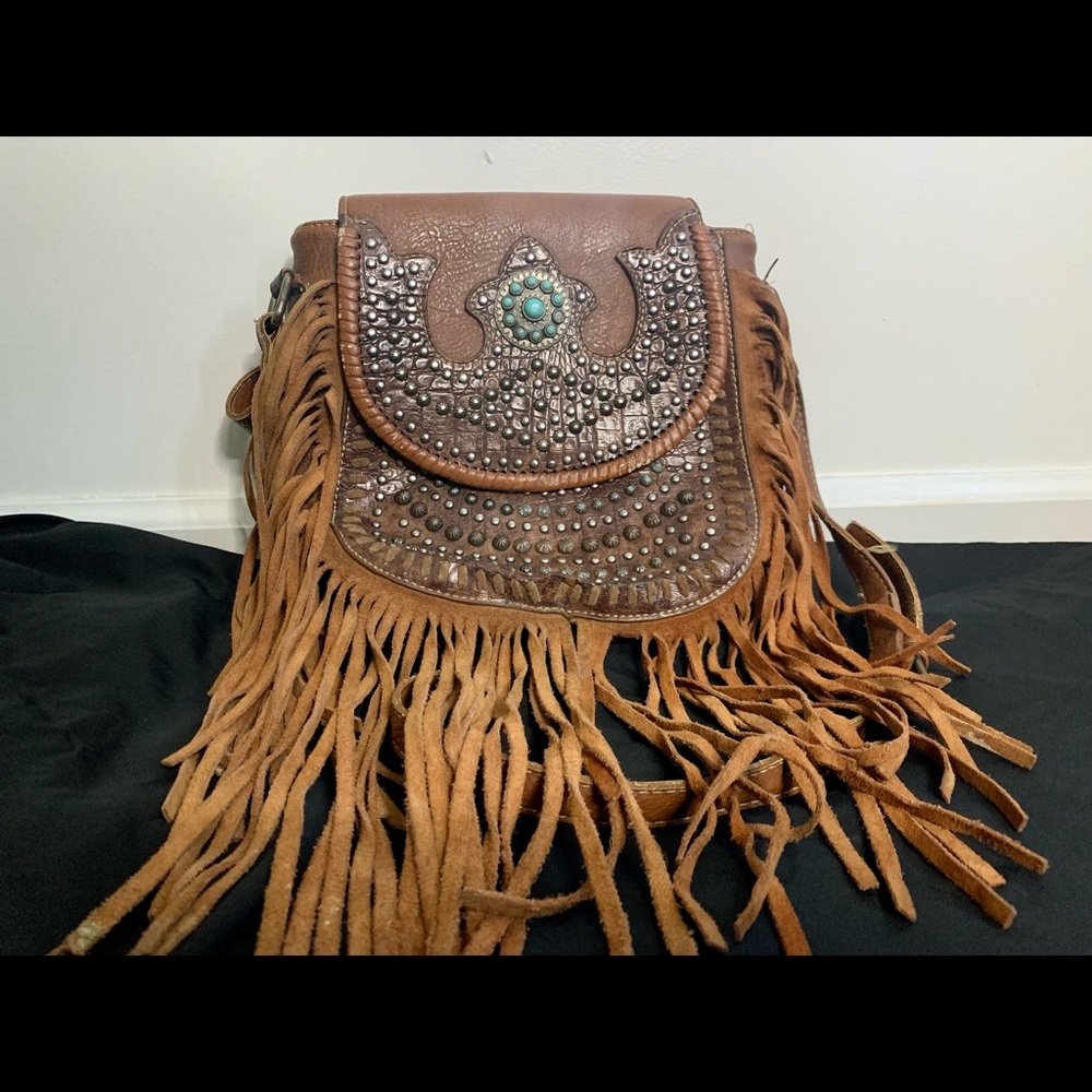 Brown country purse, good shape worn out a bit tho will lower price if needed.